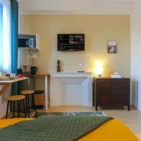Logement court sejour centre Amiens cuisine et lit double